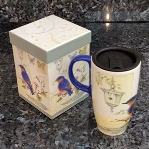 CYPRESS “Blue Birds and Butterflies” 17 oz travel mug.